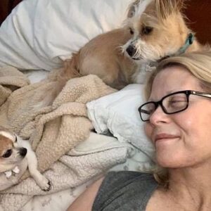 Barbara Niven Instagram - Did you know that October 1st is #NationalWalkYourDog day? Here’s a shot of us AFTER the walk relaxing. 😜 #dogsofinstagram #adoptdontshop