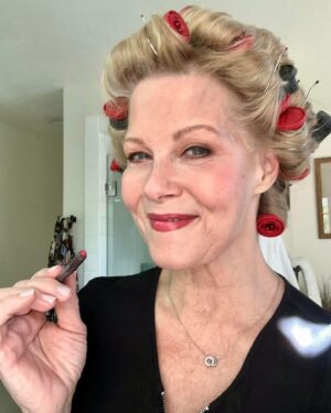 Barbara Niven Instagram - Trying to make Dolores proud tonight with red lips and curls. Boy, it’s hard to be high maintenance like her. See you on Facebook LIVE in about 20 mins! #hannahswensen