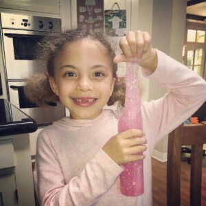 Beth Littleford Instagram - All she wants for Christmas is her two front teeth. And, of course, some pink glitter slime.