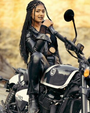 Bhoomi Shetty Instagram - Not all storms bring destruction,
Some bring liberation 🌟🧿
.
.
.
.
.
Photography @maidana.evaphotofilms 
Styling @_shilpa_hegde 
MUA @that_tyagi_girl 
Production @parashu.films 
.
.
.
.
.
.
.
.
#alittlebrowngirl #bhoomishetty #actor #biker #braids #hairgoals #royalenfield #ride #grip #motorcycle #motogirl #bikersofinstagram #sandalwood #tollywood #kollywood #mollywood