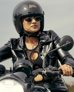 Bhoomi Shetty Instagram - Not all storms bring destruction,
Some bring liberation 🌟🧿
.
.
.
.
.
Photography @maidana.evaphotofilms 
Styling @_shilpa_hegde 
MUA @that_tyagi_girl 
Production @parashu.films 
.
.
.
.
.
.
.
.
#alittlebrowngirl #bhoomishetty #actor #biker #braids #hairgoals #royalenfield #ride #grip #motorcycle #motogirl #bikersofinstagram #sandalwood #tollywood #kollywood #mollywood