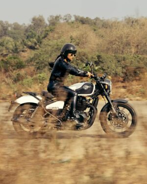 Bhoomi Shetty Instagram - Not all storms bring destruction,
Some bring liberation 🌟🧿
.
.
.
.
.
Photography @maidana.evaphotofilms 
Styling @_shilpa_hegde 
MUA @that_tyagi_girl 
Production @parashu.films 
.
.
.
.
.
.
.
.
#alittlebrowngirl #bhoomishetty #actor #biker #braids #hairgoals #royalenfield #ride #grip #motorcycle #motogirl #bikersofinstagram #sandalwood #tollywood #kollywood #mollywood