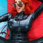 Bianca Beauchamp Instagram - Latex by the pool, enjoying the last warm days! SET at I❤️B #pool #sunglasses #cool #latex #catsuit #catwoman