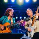 Bonnie Raitt Instagram – That’s a wrap on the tour for 2023! Bonnie and the band finished up their 50th headlining show of 2023 with a sold out show @acllive at The Moody Theatre in Austin on Saturday night, followed on Sunday by a taping of the iconic @acltv television series that will broadcast on @pbs in the beginning of 2024 (including a special appearance by singer-songwriter, @sunnywarmusic.) 

Not quite ready to leave the “Live Music Capital of the World” just yet, Bonnie made a surprise appearance at a special concert at the legendary blues club, @antonesnightclub in Austin, Texas, Monday, October 16. The concert benefiting bassist Sarah Brown, who’s been a beloved figure in the Austin music scene and member of the venue’s house band for the past 40 years, also featured performances by @jimmievaughanofficial, Marcia Ball, @suefoleyofficial, @johnnynicholasblues, Fran Christina, @rosierockabillyfilly, Larry Fulcher, @thetexashorns3, Derek O’Brien and more. (Sarah and others pictured below) The concert aimed to raise awareness of the Living Liver Donor program in an effort to help Brown, a friend of Bonnie’s for over 50 years, find a liver donor match. If you’re interested in learning more about living liver donation, please visit the link in bio. 

Bonnie, the band, crew, all her special guests and us at BRHQ want to send a huge “THANK YOU” to the fans who brought us all so much joy and appreciation this year. We love you too! — BRHQ

Slide 1 – Photo by Scott Newton for ACL & Austin PBS
Slide 2 – Photo by Daniel Cavazos/IG: @firstthreesongs
Slide 3 – Photo by Daniel Cavazos/IG: @firstthreesongs