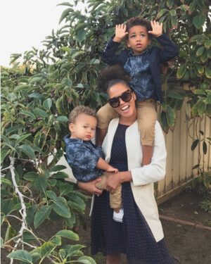 Breegan Jane Instagram - Memories held within this photo are hard. That smile makes holding both of my children—alone—look so effortless, even though they collectively were more than what was physically comfortable. My face only camouflaged what was an extremely difficult time for me. Even the shades hid the fact that I literally had no time for makeup…or much else. It was such a challenging Thanksgiving holiday. I was surrounded by friends and family, but I felt so alone. The harsh reality of becoming the head of my own household came swiftly and without choice. It wasn’t the hand I wanted, but it was the hand I was dealt. Nevertheless, I refused to let circumstances take me or my family down. The tenacity of a woman and mother will always triumph, and I am proof of that today.