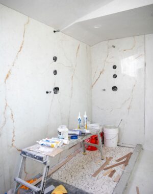 Breegan Jane Instagram - “The ability to simplify means to eliminate the unnecessary, so that the necessary may speak.” —Hans Hofman
I will never tire of the beauty of stone. I leaned into stately stone throughout my home—my shower walls, kitchen counters, refrigerator and more.That meant I needed less decorative elements scattered about. Stone feels regal and timeless. When you install it in a space, let it take its rightful place as the leading role. Give it room to be the star. Elegance is in the simplicity. Go classic in some spaces so that you can go BOLD in others! You’ll see that philosophy in the build of my home!