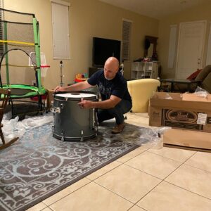 Briana Renee Instagram - Happy Valen-time’s with my handsome Valentine’s 💙🤘🏻 How we celebrate : Go to @guitarcenter, buy a drum set for my most deserving hubby, eat some pizza (him) and a sandwich (moi); then enjoy the night with drum play and snuggles 💙 Maverick has found his “spark” 🥁 #happyvalentinesday #Manningstyle #myhandsomes #truelove #letsmakemusictogether #musical #therealreasonifellinlovewithhim 😘