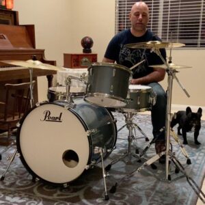 Briana Renee Instagram - Happy Valen-time’s with my handsome Valentine’s 💙🤘🏻 How we celebrate : Go to @guitarcenter, buy a drum set for my most deserving hubby, eat some pizza (him) and a sandwich (moi); then enjoy the night with drum play and snuggles 💙 Maverick has found his “spark” 🥁 #happyvalentinesday #Manningstyle #myhandsomes #truelove #letsmakemusictogether #musical #therealreasonifellinlovewithhim 😘