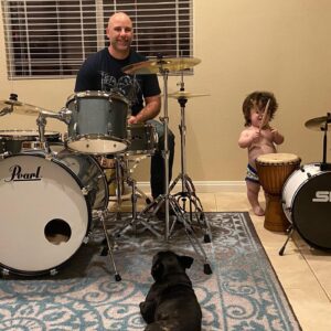 Briana Renee Instagram - Happy Valen-time’s with my handsome Valentine’s 💙🤘🏻 How we celebrate : Go to @guitarcenter, buy a drum set for my most deserving hubby, eat some pizza (him) and a sandwich (moi); then enjoy the night with drum play and snuggles 💙 Maverick has found his “spark” 🥁 #happyvalentinesday #Manningstyle #myhandsomes #truelove #letsmakemusictogether #musical #therealreasonifellinlovewithhim 😘
