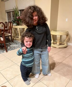 Briana Renee Instagram - My curly tops 😍 Got it from their Paca {my dad}! They love each other to no end, and I could not ask for more 😜 #myheart #proudmama #1stgrade #8th