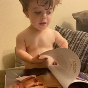 Briana Renee Instagram - My copy of “Best Wishes Warmest Regards” by @instadanjlevy & Eugene Levy arrived today, and Maverick has claimed it as his own😍 He has been “reading” each page, and loves it almost as much as I love the show 👉🏻 @schittscreek 💜 Thank you Dan & Eugene Levy for creating the perfect series #schittscreek #bestshowever