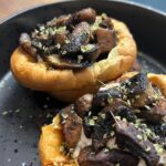 Briony May Williams Instagram – Next up in my Sensationally Seasonal Series are mushrooms 🍄 I know a lot of people love to hate them but I think they are great and these Mini Dutch Baby Pancakes with Mushrooms are a different take on a big version I made last week on Morning Live ❤️ These would make a great breakfast, lunch or dinner and you can mix up what you fill them with 💕 Enjoy! 

Ingredients
Pancakes
2 tbsp vegetable oil
100g plain flour
3 large eggs
150ml milk
½ tsp salt
1 tsp mixed herbs 

Filling
20g butter
250g button mushrooms
2 tsp smoked paprika 
2 tsp cumin

Dressing 
2 tbsp creme fraiche
1 tsp smoked paprika 
1 tsp cumin

Method
Oven on 220C. Divide the vegetable oil between 6 muffin spaces in a muffin tin then pop in the oven.
In a bowl, mix the flour, eggs, milk, salt and mixed herbs then blitz with a stick blender or whisk well until smooth. Transfer to a jug.  Let rest for 5 minutes.
Open the oven, pull out the tray with the pan on and pour in the batter evenly between the 6 muffin spaces (it should sizzle). Close the oven and bake for 20 minutes until risen (they should look like yorkshire puddings).
Whilst the pancake is cooking, prep the filling. Heat a drizzle of oil in a frying pan then add the mushroom and cook for 5 minutes until starting to brown. Add the butter and the spices plus a pinch of salt and pepper and cook for a further 5 minutes. Mix the creme fraiche and spices together with a pinch of salt and pepper.
Retrieve the pancakes from the oven, slice open, spread the creme fraiche mixture over the base, sprinkle on the mushrooms, top with a sprinkle of salt and serve.

#recipe #seasonal #seasonalfood #cake #yummy #delicious #tasty #homebaking #baking #cakedecorating #homebaker #dessert #bakery #edible #mushrooms #pancake #dutchbabypancake #savoury #pancakeday 
#mouthwatering #ingredient #easyrecipes #foodideas #instruction
