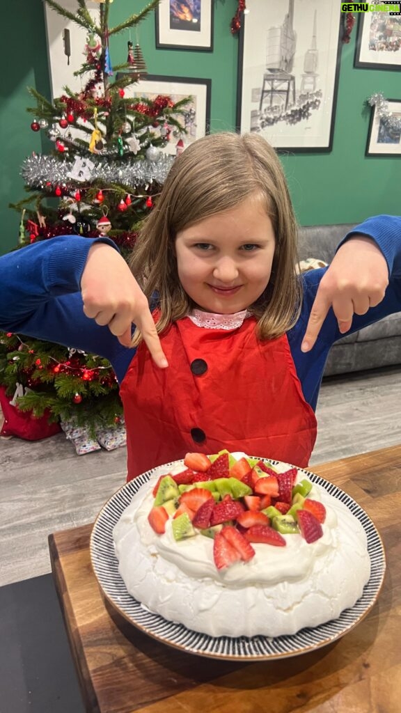 Briony May Williams Instagram - #Ad We blooming LOVE Bluey in our house so we’ve whipped up a for real life ‘Bluey-tastic Pavlova’ to celebrate the festivities 💙 Unfortunately, Daddy didn’t quite understand what goes in a yummy pavlova but he tried 🤣 You can catch Bluey, Bingo and the rest of the Heeler family in new series 3 episodes now on CBeebies via iPlayer 💙 If you want to make your own ‘Blueyplova’, check out the recipe below…let’s do this! @officialblueytv *Remember to chop fruit to appropriate size for young children* Bluey-tastic Pavlova Ingredients 6 large eggs 350g golden caster sugar ½ tsp cream of tartar To finish 300ml double cream 1 tsp vanilla extract Strawberries and kiwis, peeled and chopped Method Oven on to 120C fan/140C. Line a baking tray with parchment paper. Separate the egg whites into a bowl then add the cream of tartar. Using an electric whisk, beat the egg whites until foamy and doubled in size. Add the sugar a tablespoon at a time, whisking well between each spoonful. Once all the sugar is incorporated, whisk until thick, glossy and you can tip the bowl upside down over your head without it falling out. Tip the Bluey-tastic meringue onto the prepared tray and spread into a circle (roughly 10 inches) then use the back of a tablespoon to drag the meringue up from the base to create a vertical ribbed pattern. Bake for 20 minutes then turn the oven down to 80C fan/100C and bake for a further 60 minutes. Once baked, turn off the oven and prop open the door with a wooden spoon then leave to cool in there for a few hours or overnight. Whisk the double cream and vanilla extract until stiff peaks. Spread over the top of the pavlova and sprinkle on the fruit. Enjoy!