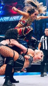 Brittany Baker Instagram - The stomp felt around the world 🌎 #AEWAllIn #AEW 📸: