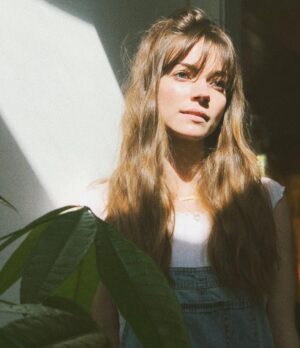 Caitlin Carver Instagram - @carachele gave me bangs & @haleyluhoo took a photo of me. I love you both. So much. Happy Earth Day ☀️🌴🌵🌻🧡✨