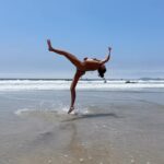 Caitlin Dechelle Instagram - lost in the thrill of it all ☀️🌊 @oneoneswim