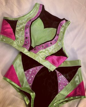 Candice LeRae Instagram - When I started wrestling I couldn’t afford gear. My Mom knew how to sew & I asked her to make gear for me. I’d buy fabric and she’d work her magic. After a couple years of helping and watching her, I learned how to make it myself.

I’ve made my own gear for the majority of my 20 wrestling career. Including all of my gear I ever wore in NXT (excluding some sweet sets of entrance wings and vests). 

Well… now I’m a Mom. I want to be present with Quill and Pawdmé when I’m home from work. I didn’t think I’d be able to design or make myself new gear anytime soon. Johnny surprised me and has some designed by @davenpoe and made by @maineventgear AND…. It’s Maleficent inspired. I did add a little pixie dust and a hidden Mickey (for my fellow Disney nerds out there).

It was an absolute “Cinderella going to the ball” set of gear. 💙🤍✨