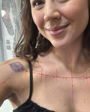 Carla Dunareanu Instagram - Waited nearly 2 years to finally get new ink! (Pregnancy and first year of breastfeeding) 

I had soooo many designs saved in Pinterest (😂😂) of things I wanted to do. But in the recent months when my Grandma’s health was deteriorating I knew I wanted something to symbolise her. Since I was born she’s the only grandparent I’ve ever had. 35 years of only THIS Grandma. So I know when she goes she’s going to leave a huge void. 

I saw @md.poke ‘s work last years and I’ve been following her on Instagram for a while always in awe of her beautiful and intricate designs. She was gonna be in Singapore for a guest spot at @feather.cloud.tattoo but unfortunately all her slots were snatched up. I still sent her a message just to tell her I was a big fan and I’d love to one day get tattooed by her. She told me she flies of on the 12th of March but she could come into the studio and do a tattoo for me. How on earth could I have said no???? I looked through her flashes and picked this one cause it reminded me of Peranakan tiles (my grandma is Peranakan) I wanted it to be symmetrical because my Grandma has always provided balance for the family, even if she had to raise 9 kids all on her own. The fact that it was a hand poke tattoo and I got to fully experience every single dot of ink into my skin made it 1000% more meaningful (and to answer your question, no, it didn’t hurt very much) 

My mum was gonna watch Peanut during my appointment but she had to suddenly go take care of my grandma. I was gonna cancel my appointment reluctantly but the best guy @sohnx (also an artist at @feather.cloud.tattoo ) offered to watch Peanut while I got tattooed. 

THIS is the kind of community people talk about. ❤️❤️❤️❤️ I loved every part of this experience. And I’m so thankful I get to tell the story every time someone compliments my tattoo. 

#tattoo #singapore