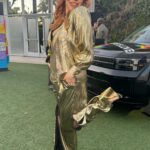 Carmit Bachar Instagram - Felt cute, still do. Not deleting😎 Vintage @ysl suit @pierrehardy wedge @moschino 👜 @karenwalker 👓 @nonjamckenzie Mua @michpage Hair @glambyziggy @glaad #glaadawards