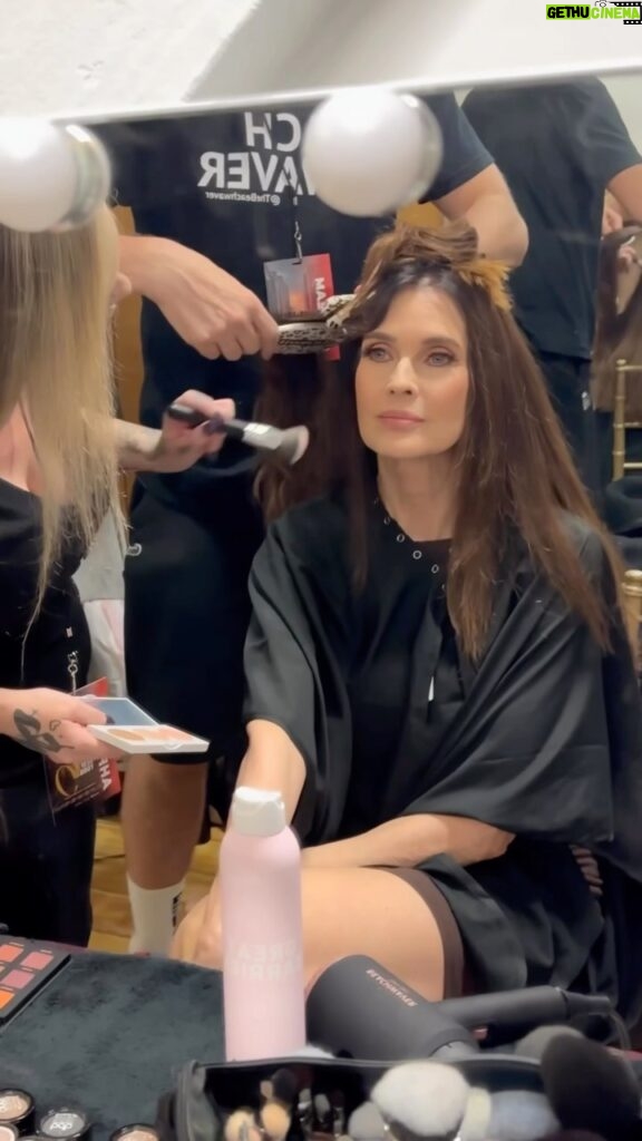 Carol Alt Instagram - Makeup and #hair time! The excitement of #fashionweek has kicked off! Getting ready to slay the runway with the talented @nizie_emirshah, a young designer with immense potential. It’s all about #womensupportingwomen in the world of fashion. Stay tuned, I’ll be sharing the final look in just a moment! 💄💁‍♀️💅 #fashionista #runwayready #behindthescenes