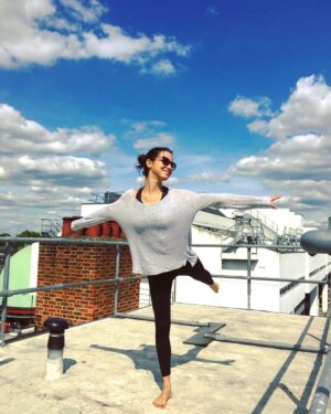 Caroline Ford Instagram - Playing is very important, especially when on rooftops in the sunshine.