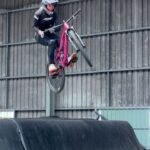 Caroline Buchanan Instagram - 🤯 I never thought I would be bar-spinning spines…But here we are! Couldn’t do it without the coaching and support from @joshkcoaching helping me LEAN IN and prep for @fmbworldtour x @crankworx #mtb #skatepark #spine #slopestylemtb #fmbworldtour #crankworx #levelupskatepark