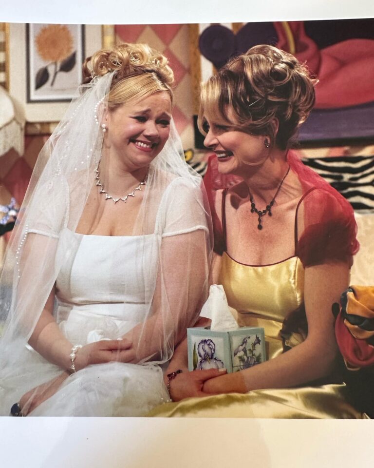Caroline Rhea Instagram - This is a good one. It was my last day filming and @bethabroderick and I were laughing and crying in Sabrina’s bedroom(NO I HAVE BEEN CORRECTED IT WAS THE ONLY TIME WE EVER SAW HILDAS BEDROOM)I still have this wedding dress even though Stella ate most of the veil. I always thought it would be fun like in #thesisterhoodofthetravelingpants that this magical dress could fit anyone. Let me know if you’re getting married. Also please enjoy my hair which appears to be lacquered to my head but was very on point at the time @chezralphie . Those were fun days!!! #Bestwitches BTW @melissajoanhart killed on her first time on stage doing stand-up. A total natural . Made her Aunt very proud. #familybusiness #90s #tbt #sabrinatheteenagewitch #AuntHilda #standupcomedy #weddings