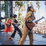 Carrie Brownstein Instagram - Last 2021 show with @sleater_kinney at @theohanafest. Here I am with post-show hair pondering my future, taking a quick nap on @corintuckerband during the set, and playing as part of a guitar trio with Corin and @suavecito_91. 📷 @lancebangs @limaphoto