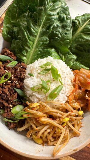 Cassie Yeung Instagram - Beef bulgogi in 30 minutes 🍚🥩

Recipe ⬇️⬇️

8oz thinly sliced beef or protein of choice 
1/2 large onion (1/4 thinly sliced, 1/4 for marinade)
1/4 Asian pear (or apple, pear, kiwi)
4 cloves garlic
2 tbsp soy sauce 
1 tbsp mirin (can sub w rice vinegar   1 tsp sugar)
1 tbsp gochujang
1 tbsp brown sugar
1 tsp sesame seeds
1 tsp sesame oil
1 green onion 

Blend all of your ingredients aside from the green onion and add to the beef. Chop green onion and onion and add in along with salt and pepper to taste. 
To a smoking hot wok, add in the meat and use your spatula to flatten out. Don’t be tempted to sauté! Allow to cook until the juices have evaporated and the bottom has become crispy. Don’t be alarmed by any burnt looking pieces, the sugar will caramelize and give you a similar Korean bbq flavor. Once the liquid is no longer visible, stir then flatten back out to cook another minute or until it reaches your desired color. 
Serve over rice or with lettuce for lettuce wraps along with your favorite sides (I like kimchi, pickled daikon and bean sprouts) and enjoy!

#beefbulgogi #healthydinners #quickdinner #bulgogi #koreanfood