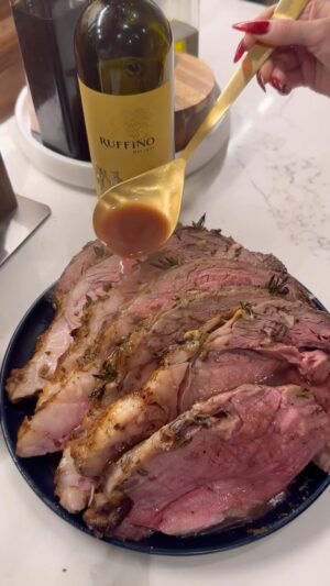 Cassie Yeung Instagram - Prime Rib for the holidays 🎄 

Recipe below ⬇️ 
(Full video on TT)

8lb Prime Rib Roast (ask the butcher to remove the bones and tie to reattach)
1 stick or half cup butter
2 sprigs fresh rosemary and extra to stuff the meat
3 sprigs fresh thyme 
1/4 cup Dijon mustard
1 tsp garlic powder
1 tsp onion powder
2 tsp Tony’s creole seasoning
1 Tbsp worchestire sauce 
Salt and pepper to taste
4-5 cloves garlic thinly sliced
2 carrots
2 celery stalks
1 onion
1 head garlic 
 
-Take prime rib roast out of the fridge to rest for at least 1 hour. Pat completely dry before seasoning. Preheat oven to 500 degrees. 

-Chop fresh rosemary and thyme and mix together with softened butter, garlic, onion, Tony’s, worchestire, salt and pepper. 

-Roughly chop onion, carrots, celery and garlic head and arrange at the bottom of a roasting pan or oven safe skillet. Drizzle with olive oil and season with salt and pepper. 

-Thinly slice garlic cloves, dip in butter and sandwich with small piece of rosemary. Taking a pairing knife, stab holes at the top of the roast and insert garlic and rosemary in. Take remaining butter and smear all over. 

Insert a thermometer into the meat, bake at 500 for 15 minutes then reduce heat to 325. Bake for 13-15 minutes per pound depending on preference. I pulled mine at 120 degrees for a medium rare. Rest for 20-30 minutes then slice and serve with horseradish sauce and au jus. 

Horseradish sauce:
1 cup sour cream
2-3 Tbsp Horseradish cream sauce
1 tsp worchestire sauce
1 Tbsp chopped chives
Pepper to taste 
(Mix well and set in the fridge)

Au jus:
2 Tbsp drippings from prime rib
1 Tbsp flour
2 cups beef broth
1 cup dry red wine (I used Chianti)
1 tsp worchestire sauce
(Heat drippings and flour until raw flour has cooked out. Add broth, wine and worschestire and heat on a rolling simmer until slightly thickened)
