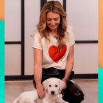 Cat Deeley Instagram – And they call it puppy love! 🐶🤍 Swipe left to pet our adorable Buddy, who’s currently being trained by @dogsforautism.🐾
