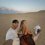 Catherine Paquin Instagram - All I want for Christmas is {traveling with} you ❤️ Incroyable la diversité des paysages d’Abu Dhabi , du désert à la mer en passant la les girafes, le surf sur les dunes et les autos sur l’eau, un rêve ✨🏄🏼‍♀️ @visitabudhabi #invitation #InAbuDhabi