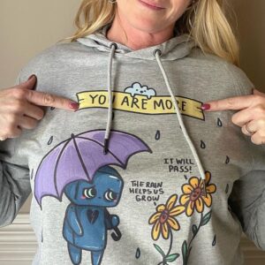 Catherine Sutherland Instagram - “It will pass” one of the most important affirmations we need to remind ourselves. It’s important to know that the storms in our lives are temporary and are meant to help us grow. 
The struggles we have with Mental Health are real. Your feelings are real. You are more capable than you could ever imagine. Keep fighting. ☔️🌻

Thank you to my friend @catherine_sutherland a superhero on the tv screen and in real life. She’s been a true supporter and believer along with @nakiaburrise on what we’re doing here. 💕

Hoodie designed and illustrated by @melotica.rt grab this design before we retire it this month. 

Link in bio

#mentalhealth #itwillpass #keepfighting #suicideprevention #depression #anxiety #youaremorethanenough #powerrangers #pinkpowerranger