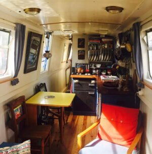 Charlie Murphy Instagram - PLUTO 2/2 OK some more Pluto pics 1:Sailing for first time! 2: With my VERY soon to be brother in law Mr Barry Bates, who came to the rescue & gutted/refitted the boat. 3:My TINY beautiful kitchen 4: Níl aon tinteán mar do thinteán féin 🔥 🖤