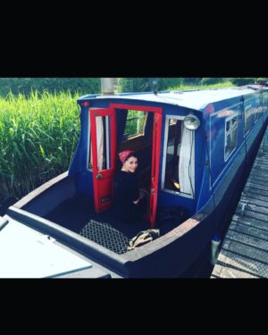 Charlie Murphy Instagram - Having just moved house last week & currently swimming in a sea of boxes, I am reminded of the very first place I bought…. PLUTO the 50ft Narrowboat. I lived on the canals of London & moved her every 2 wks. I thought I was buying my independence but it took a village of actors to help keep her afloat! Lots of fairy lights, warms beers, burnt dinners, smoky fires & Milky Chance playing on a loop. It was pretty dreamy. 🖤⚓️