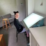 Charlotte Le Bon Instagram - J’ai une nouvelle table lumineuse et j’ai l’air, à la fois, punie et heureuse.