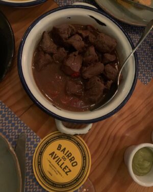 Chelsea Sheets Instagram - My last dinner in Lisbon, Portugal was at @bairrodoavillez pateo and my god was it amazing! Our waiter Dill had all of the best recommendations like lobster and shrimp rice, grilled squid with chorizo and Kimchi mayonnaise just to name a few! The pateo was large and beautiful! Looking forward to coming back! 😻