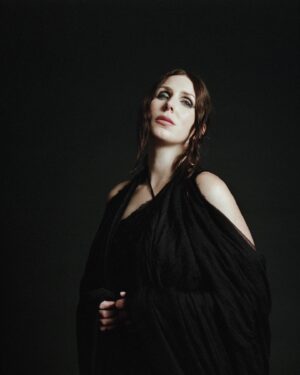 Chelsea Wolfe Instagram - today marks three weeks since my new album She Reaches Out to She Reaches Out to She was announced ((out Feb 9, 2024 on @lomavistarecordings ))   “Whispers in the Echo Chamber” came out. thanks so much to all who’ve pre-ordered the record, got tickets for shows, watched the music video, shared or reviewed the song so far ! 🖤

also I turn 40 today, feeling very glad about it ✨I don’t know if this makes sense to anyone else but I feel like this is the age I was born to be, haha 🦂 

photo by @ebruyildiz 
costume design @jennihensler 
art direction @christopherleckie 
hair/makeup @claudialakemakeup 
lighting @mitchellnking