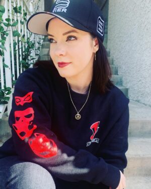 Cherami Leigh Instagram - So excited to check out the #Persona5 Collab with @stierapparel ! So many different styles to choose from, and I can’t get over how incredible the quality is. And just in time to rep the #phantomthieves all holiday season long. Be sure to check out  s-tierapparelclub.com