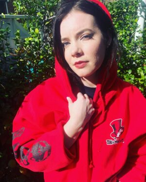 Cherami Leigh Instagram - So excited to check out the #Persona5 Collab with @stierapparel ! So many different styles to choose from, and I can’t get over how incredible the quality is. And just in time to rep the #phantomthieves all holiday season long. Be sure to check out  s-tierapparelclub.com