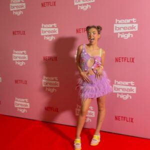 Chloé Hayden Instagram - It was free dress day for a gold coin donation and the theme was Polly Pocket
(Thank you so so so much for all the love on Season 2 so far it’s making my heart go weeee)

Stylist: @jordanboorman 
Wearing: @moniquemarschner @sarahgardnerjewellery @fluevog @autisticjewellery (and friendship bracelets made by you guys 🥺)
HMUA: @bylolawithlove @heathmassihair