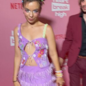 Chloé Hayden Instagram - It was free dress day for a gold coin donation and the theme was Polly Pocket
(Thank you so so so much for all the love on Season 2 so far it’s making my heart go weeee)

Stylist: @jordanboorman 
Wearing: @moniquemarschner @sarahgardnerjewellery @fluevog @autisticjewellery (and friendship bracelets made by you guys 🥺)
HMUA: @bylolawithlove @heathmassihair
