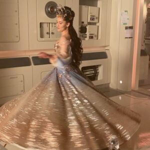Christina Chong Instagram - That Dress. 

The memories of being in that dress will forever be some of my happiest 🥰

1. My reaction on seeing @rebeccaromijn in her fantasy costume!! 

2. I couldn’t not do a slo-mo spin.

3. Quick spin for those who can’t be bothered to watch the slo-mo. 

4. @runa_ewok and I in the Captain’s chair fantasy style. 

5. The beautiful artwork design of both our costumes/the spin-off poster starring us both. 

@berncroft and #sue you are the best! 

#princessthalia #princessruna #SNW #strangenewworlds #puppy #dogsoftrek #cavapoo @startrekonpplus #startrek #bts