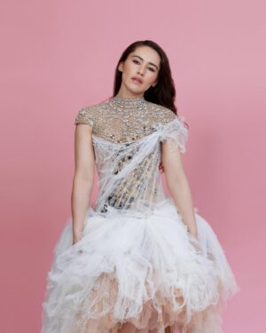 Christina Chong Instagram - We were going for an editorial style shoot and I’d recently been introduced to Sarah at @savage_and_hunt who instantly came to mind. Her designs are haute couture - yes I had to really squeeze myself into some of them - but they are so elegant, ethereal and beautiful, it was well worth the wriggle.

Hair/makeup @nohelia.reyes 
Photo @orijonesphotography 
Clothes @savage_and_hunt