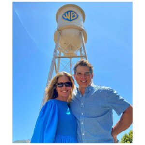 Christina Moore Instagram - When your dress & his shirt match the water tower… @warnerbrosentertainment has been so good to me over the years. Kicked off my acting career with their iconic sitcom @friends - had my first series regular job #hyperionbay - followed by many others #hotproperties #90210 
Now they’ve given me tons of producing opportunities- collaborating with his handsome fella writing #grateful 

Lots coming in 2022 #netflix #hbomax 

Pro tip- have bff @alexranarivelo, a director, take your photo (shall we try this again when Instagram isn’t changing everything all at once?) 

#excited #thefutureisbright #wb #warnerbrothers #burbank #create #femalefilmmaker