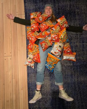 Christina Tosi Instagram - Long time listener, first time caller. Helping @cheetos celebrate their 75th bday with this cake straight from my l dessert secret dreams ( 🤫 dunking Cheetos into a tub of vanilla frosting is THE move). Snag yours at milkbarstore.com or in our NYC and LA bakeries - trust me it’s 🔥