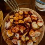Claire Coffee Instagram - Hard to convince Cal that octopus tastes like “the best chicken ever” when the actual best chicken ever is also sitting on the table. @barvinazo, you were a 10/10! Thank you @joecampanale & @chefsilviagarcianevado for bringing this absolute knockout to the neighborhood! Our order: Aceitunas Pan con tomate Boquerones Leonora Jamón ibérico de bellota Pulpo Fideuà Pollo en pepitoria MOLTEN CHOC CAKE #530res #kidfood #familymeal