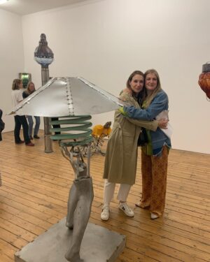 Claire Forlani Instagram - @kirafreije @approachgallery London.This unique, exquisite show METEORITES by the the beyond talented artist Kira Freije ( who I’m hugging in photo) is showing now at the The Approach Gallery until July 2 . I wanted to sit there endlessly , with my favorite piece “TheForgiver” flying over me 🖤