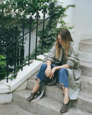 Clare Waight Keller Instagram - Back in August a young photographer approached me through Instagram about taking a portrait of me for his designer series, however I’m truly not one for this type of thing. Having a portrait taken is usually at the bottom of my list. 
But I decided to take a look at Andrew’s work and I really liked what I saw. 
It’s all shot on old cameras 35mm film or those pointn’shoot wind on pocket cameras - no way to see the results live as we do all the time today on digital. The other big difference is without all that jumping to look at the monitor to check the images we just chatted, got to know each other a bit.
So of course there is the element of the surprise and reveal when everything is developed. 
So here they are - the lovely unfiltered results 🖤. Thank you so much @anxxquinn for such a fun morning together in my neighbourhood.