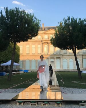 Clare Waight Keller Instagram - The next couture chapter was Caraman - I named this collection after the 19th century townhouse originally built for the Duke of Caraman. This beautiful building became the Haute Couture atelier and salon of Hubert de Givenchy, where it still remains today on Avenue George V. 
I think for many people this was one of those shows that really resonated deeply with the story of Givenchy. 
It was a moment that really struck a very emotional chord with the audience and my team backstage, particularly as it was so soon after both the Royal Wedding and Hubert’s death. 
I had always personally felt that the Givenchy archives were a mystery, rarely seen in public exhibitions nor books despite his extraordinary contributions to fashion in film and the history of fashion in celebrity culture. 
I felt a profound connection to his craft as I searched through his legacy to honour his life through this show. I wanted to capture the essence of his work and vision of women through my own lens. 
In the images here - the looks hanging in the Couture salon, the show venue in the Musée de Archives garden in the heart of the Marais on a stunning summer evening, rehearsals in the afternoon before the show with the production team still finishing the set up, whilst I’m listening to the music to set the pace of the models. 

#hautecouture #paris #fashion #style #audreyhepburn #givenchy